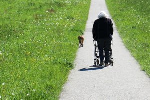 Elderly Woman Using Walker