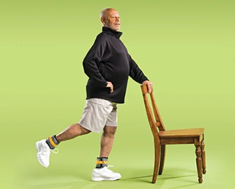 Senior Doing Back Leg Raise